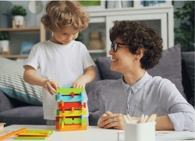 Family collaborating during a coaching session at home.